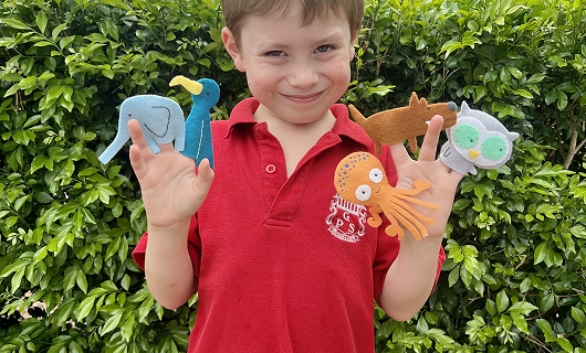 Parent and child reading together at home